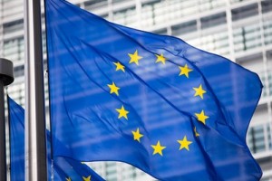 EU flag in front of Berlaymont building facade